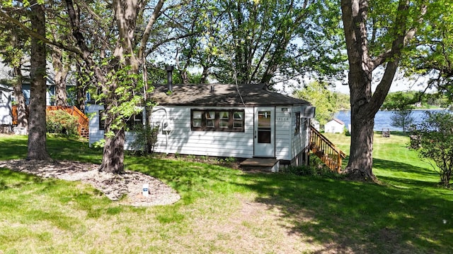 view of outbuilding featuring a water view