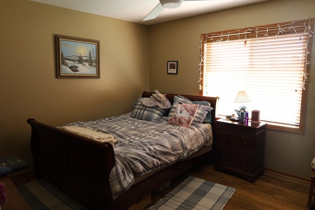 302 Pine St, Cannon Falls, MN 55009 - bedroom with dark wood-style flooring and a ceiling fan