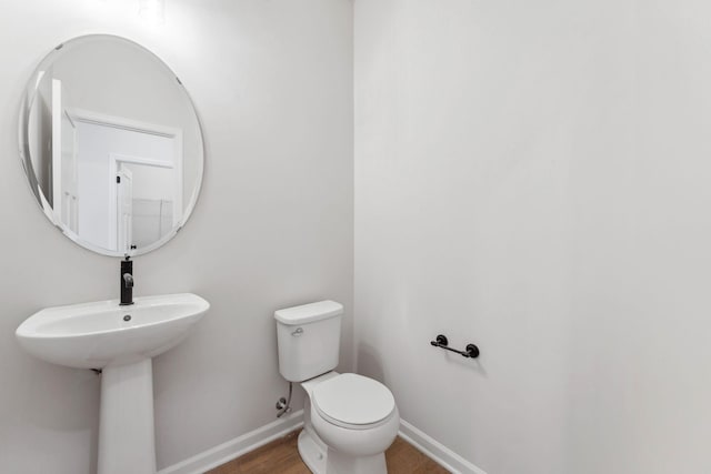 20104 78th Pl, Corcoran, MN 55340 - half bath with baseboards and wood finished floors