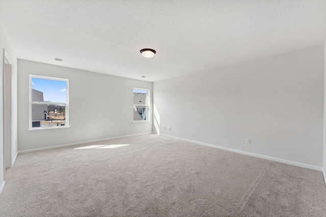 20104 78th Pl, Corcoran, MN 55340 - spare room featuring carpet and baseboards