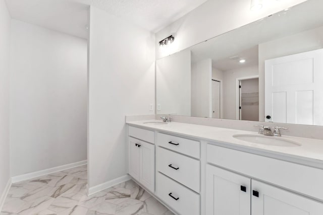 20104 78th Pl, Corcoran, MN 55340 - full bath featuring double vanity, marble look tile flooring, and a walk in closet
