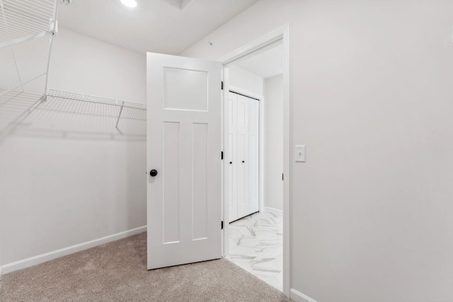 20104 78th Pl, Corcoran, MN 55340 - walk in closet featuring marble finish flooring