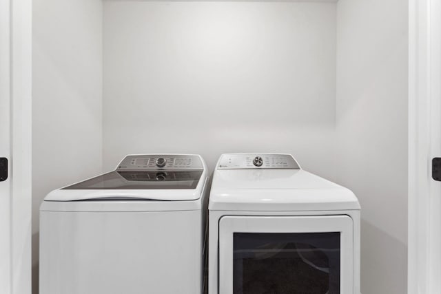 20104 78th Pl, Corcoran, MN 55340 - laundry room featuring washing machine and clothes dryer