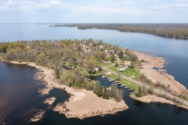 aerial view of property's location with a nearby body of water