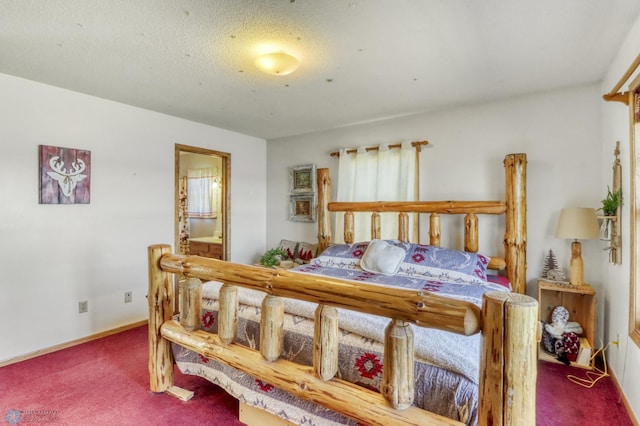 bedroom with carpet, ensuite bath, and baseboards
