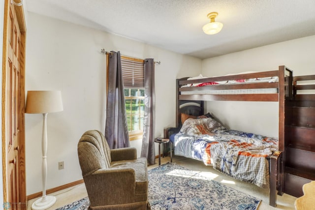 bedroom featuring baseboards