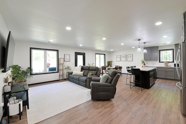 14840 Eaglewood Dr, Burlington Twp, MN 56501 - living area with recessed lighting and light wood-type flooring