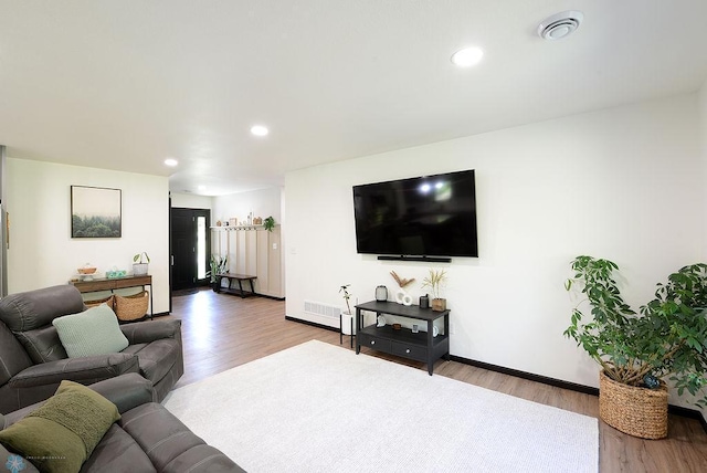 14840 Eaglewood Dr, Burlington Twp, MN 56501 - living area with wood finished floors, recessed lighting, and baseboards