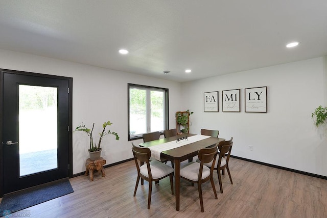 14840 Eaglewood Dr, Burlington Twp, MN 56501 - dining space with light wood finished floors, baseboards, and recessed lighting