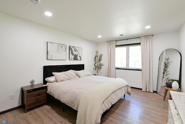 14840 Eaglewood Dr, Burlington Twp, MN 56501 - bedroom with light wood-style floors, recessed lighting, and baseboards