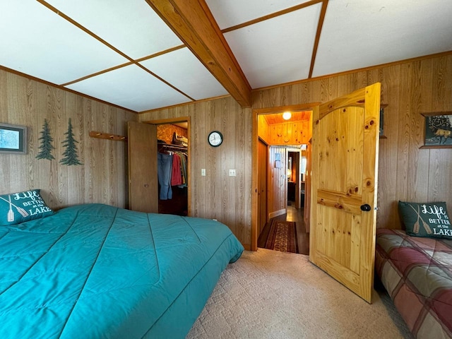 3291 Thomas Rd, Greenwood Twp, MN 55790 - bedroom with wooden walls, carpet, and a closet