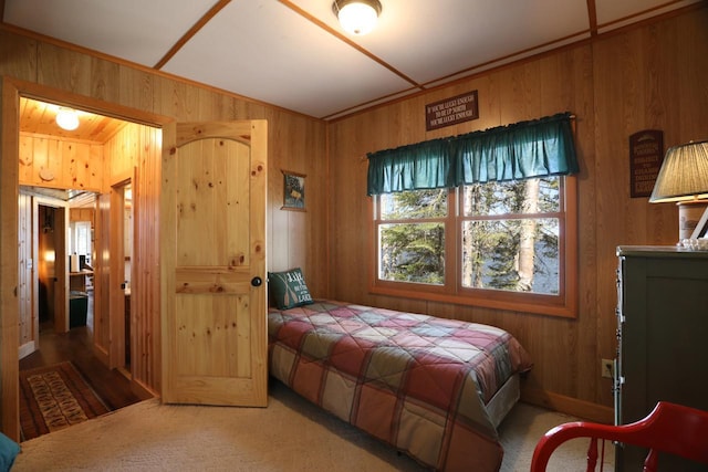 3291 Thomas Rd, Greenwood Twp, MN 55790 - carpeted bedroom with wooden walls
