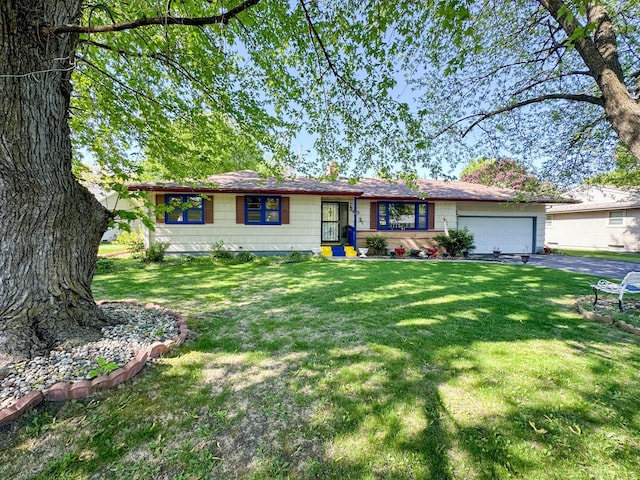 403 Dayton St, Arlington, MN 55307 - single story home with driveway, an attached garage, and a front lawn