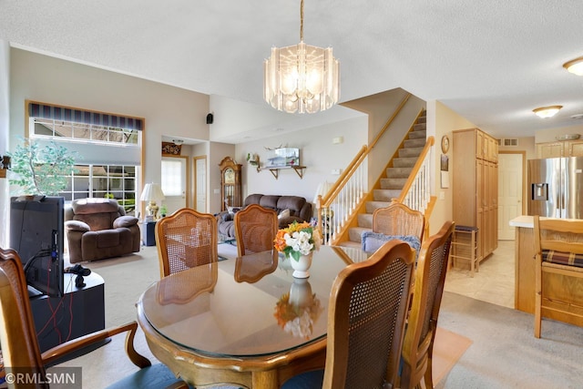1785 Riverwood Dr, Burnsville, MN 55337 - dining space featuring light colored carpet, a chandelier, stairway, and a textured ceiling