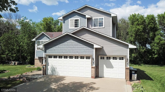 155 Palomino Ln, Lino Lakes, MN 55014 - view of front facade with driveway, a front yard, a garage, and brick siding
