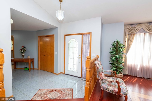 155 Palomino Ln, Lino Lakes, MN 55014 - foyer featuring baseboards and lofted ceiling