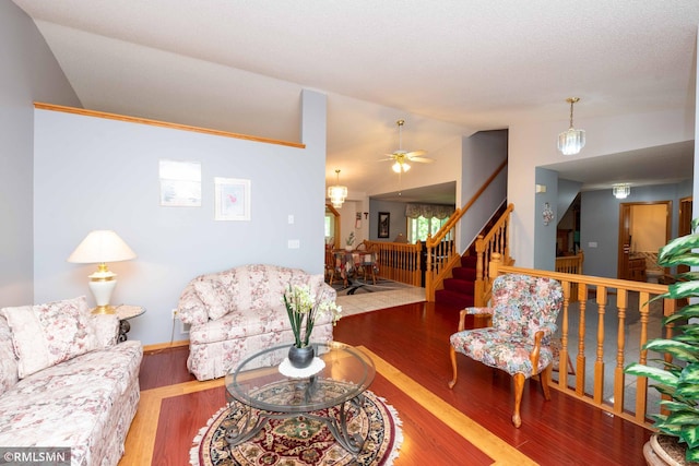 155 Palomino Ln, Lino Lakes, MN 55014 - living room featuring vaulted ceiling, stairs, wood finished floors, and ceiling fan