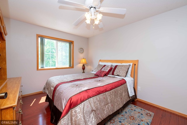 155 Palomino Ln, Lino Lakes, MN 55014 - bedroom with wood finished floors, baseboards, and a ceiling fan
