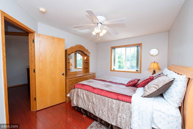 155 Palomino Ln, Lino Lakes, MN 55014 - bedroom featuring wood finished floors, ceiling fan, and a textured ceiling