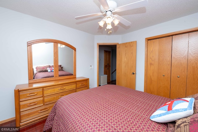 155 Palomino Ln, Lino Lakes, MN 55014 - bedroom with a closet, a ceiling fan, and a textured ceiling
