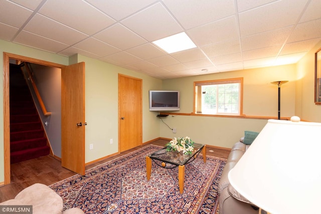 155 Palomino Ln, Lino Lakes, MN 55014 - living room with a paneled ceiling, wood finished floors, stairway, and baseboards