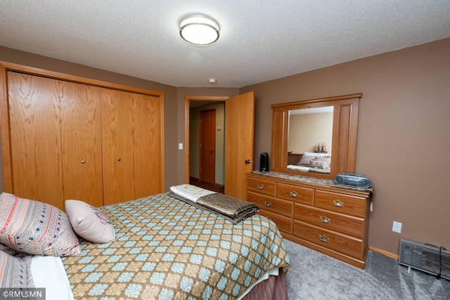 155 Palomino Ln, Lino Lakes, MN 55014 - carpeted bedroom with a closet and a textured ceiling
