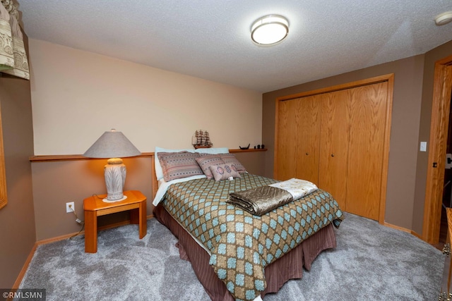 155 Palomino Ln, Lino Lakes, MN 55014 - carpeted bedroom with a closet, a textured ceiling, and baseboards