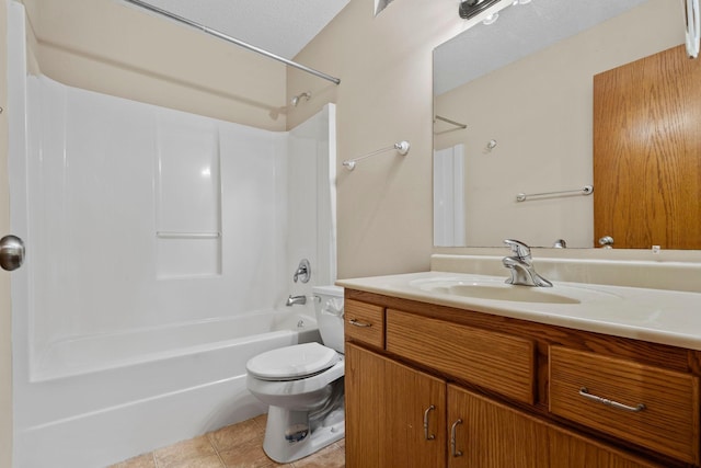 full bath with toilet, shower / washtub combination, vanity, and tile patterned flooring