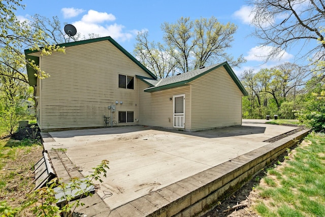 rear view of house featuring a patio area