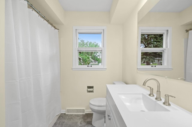 2756 Sunset Ln, Burnsville, MN 55337 - bathroom featuring toilet, vanity, baseboards, and curtained shower