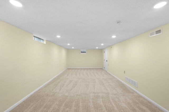 2756 Sunset Ln, Burnsville, MN 55337 - below grade area with baseboards, recessed lighting, and light colored carpet