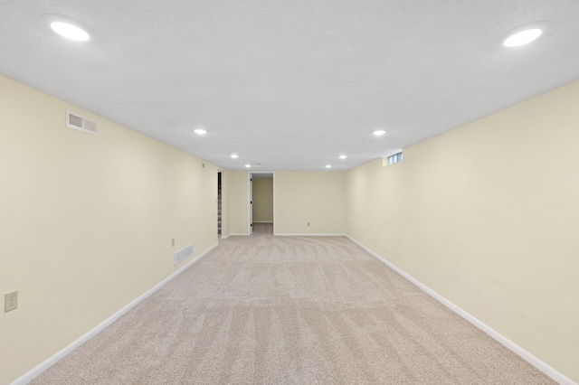 2756 Sunset Ln, Burnsville, MN 55337 - finished below grade area with baseboards, recessed lighting, and light colored carpet