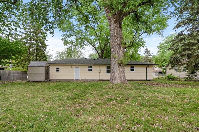 2756 Sunset Ln, Burnsville, MN 55337 - back of property featuring a shed, an outdoor structure, and crawl space