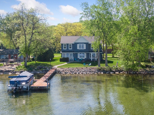 10547 Hollister Ave NW, Maple Lake, MN 55358 - dock featuring boat lift, a water view, and a yard