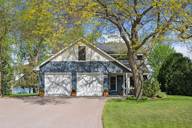 10547 Hollister Ave NW, Maple Lake, MN 55358 - traditional-style house with a front lawn, driveway, and an attached garage