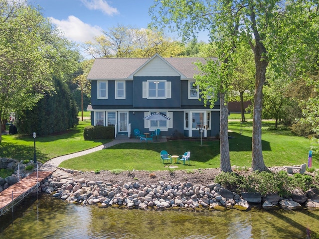 10547 Hollister Ave NW, Maple Lake, MN 55358 - back of house featuring a yard and a patio