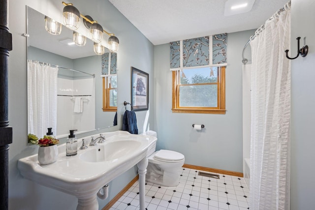 10547 Hollister Ave NW, Maple Lake, MN 55358 - full bathroom with toilet, baseboards, tile patterned floors, and shower / tub combo with curtain