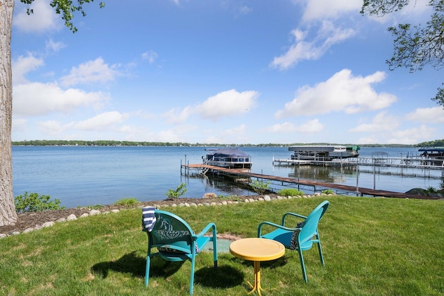 10547 Hollister Ave NW, Maple Lake, MN 55358 - dock area featuring a yard, a water view, and boat lift
