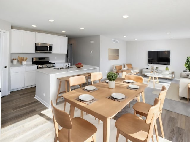 3216 Kady Ave NE, Saint Michael, MN 55376 - dining space featuring light wood-style floors and recessed lighting