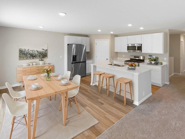 3216 Kady Ave NE, Saint Michael, MN 55376 - dining area with recessed lighting, baseboards, and light wood-style flooring