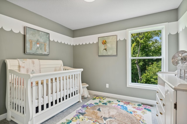 9587 Jada Way, Elko New Market, MN 55020 - bedroom with baseboards, a crib, and carpet flooring