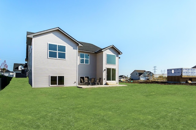 rear view of property with a patio