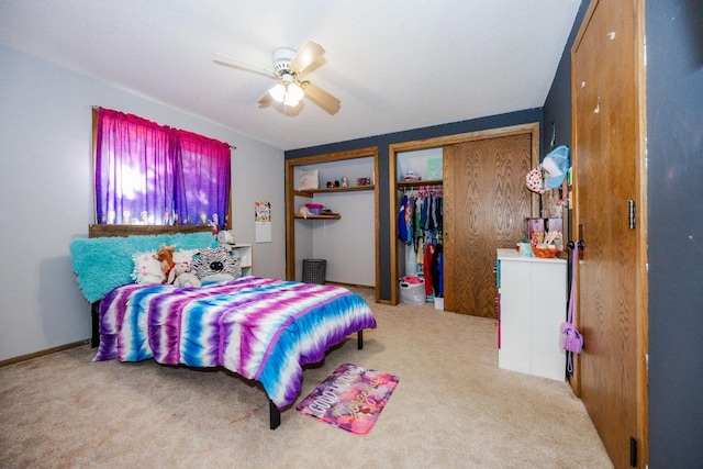 35445 County Highway 36, Vergas, MN 56587 - carpeted bedroom featuring multiple closets and ceiling fan