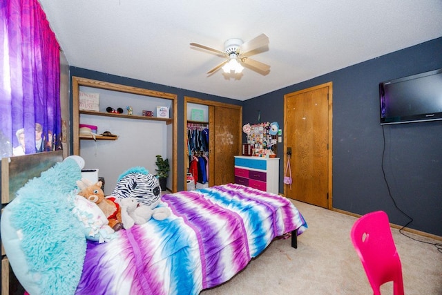 35445 County Highway 36, Vergas, MN 56587 - bedroom with two closets, carpet flooring, a ceiling fan, and baseboards