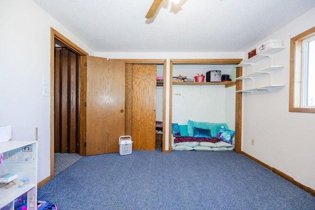 35445 County Highway 36, Vergas, MN 56587 - bedroom featuring carpet, multiple closets, and ceiling fan