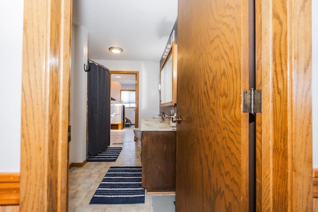 35445 County Highway 36, Vergas, MN 56587 - corridor featuring a sink and baseboards