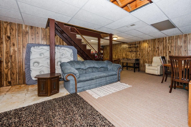 35445 County Highway 36, Vergas, MN 56587 - carpeted living room featuring wooden walls, stairway, and a paneled ceiling