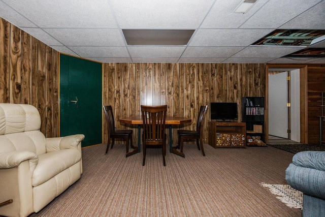 35445 County Highway 36, Vergas, MN 56587 - carpeted dining space with wood walls and a drop ceiling