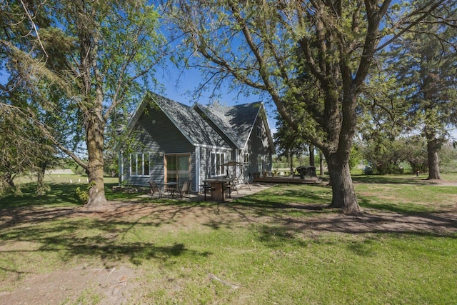35445 County Highway 36, Vergas, MN 56587 - view of property exterior featuring a yard and a patio area