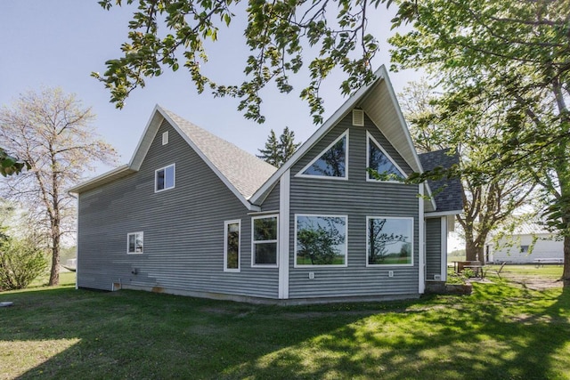 35445 County Highway 36, Vergas, MN 56587 - rear view of house featuring a lawn and a shingled roof